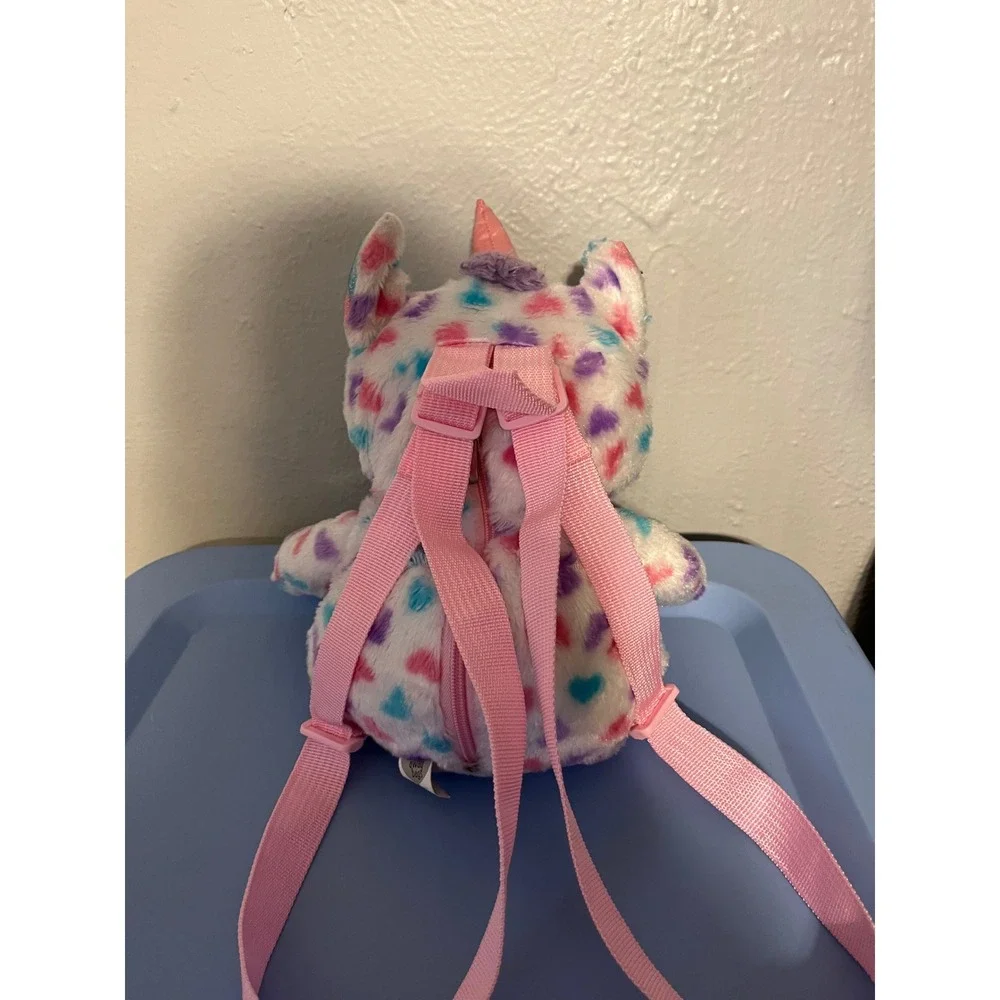 Carried Away Bags Kids Plush Unicorn Backpack White Heart Print Faux Fur Pink